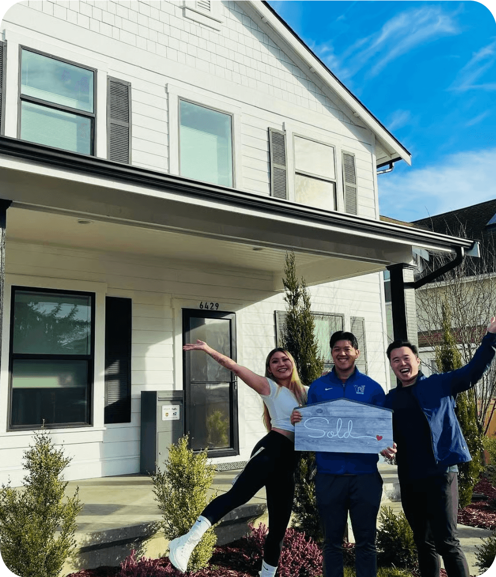 Michael Lee celebrating a sold home with clients